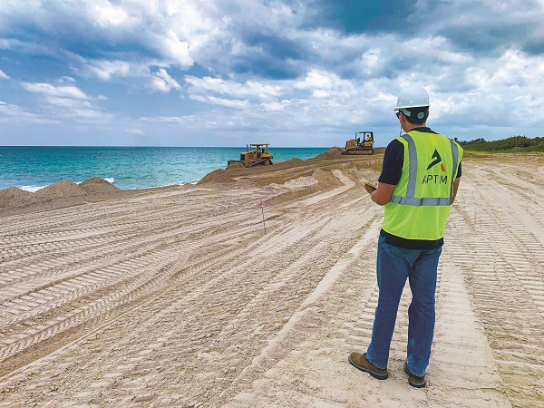 APTIM Coastal Engineering and Modeling project manager assesses dredging and beach restoration project to protect coastal communities from erosion. 