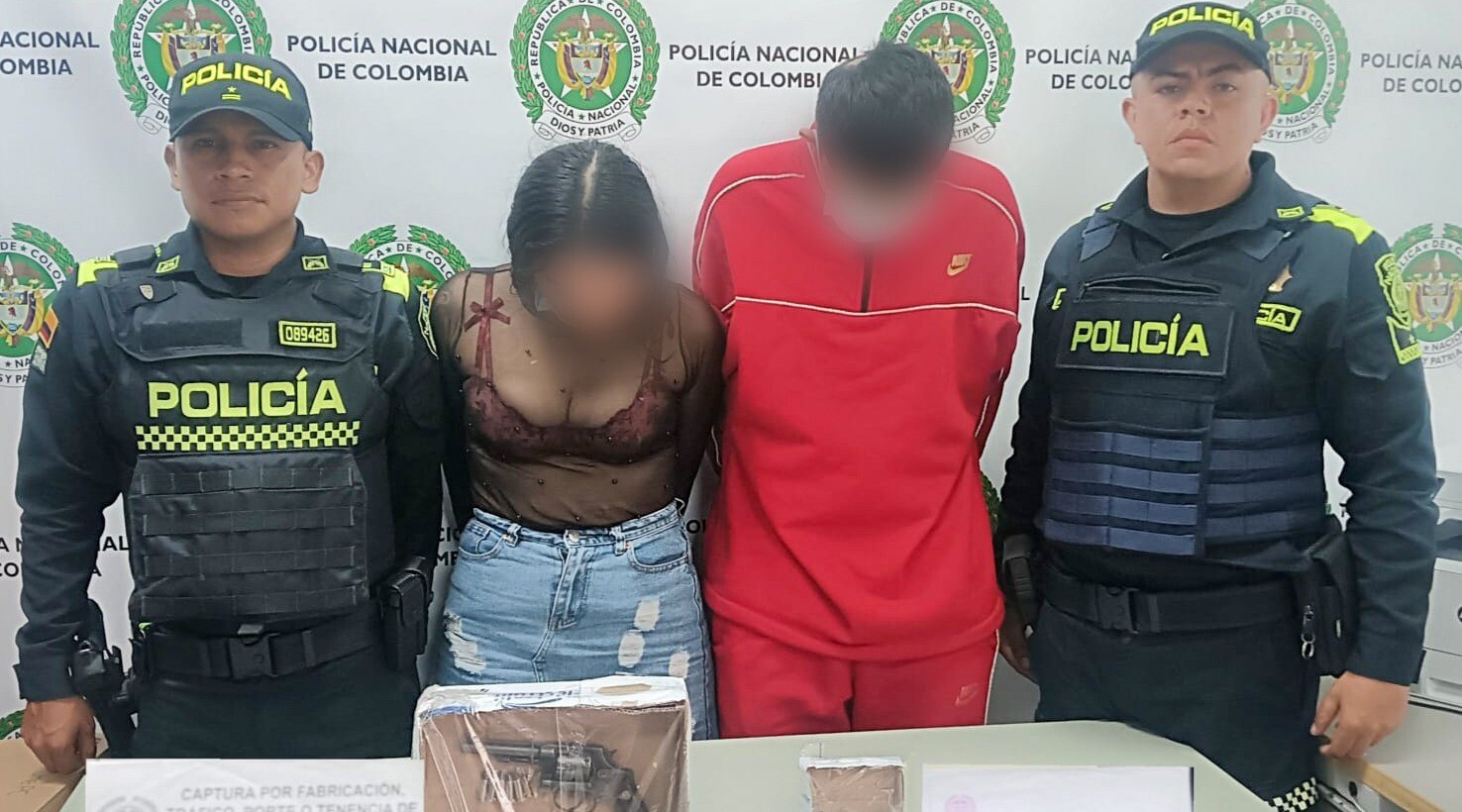 Capturan en Ibagué pareja en moto con un revólver y blindaje balístico