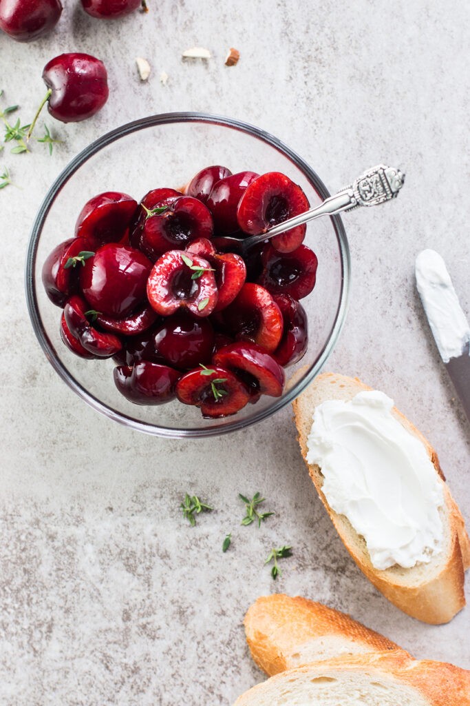 Cherry Goat Cheese Crostini with Thyme and Almonds Image