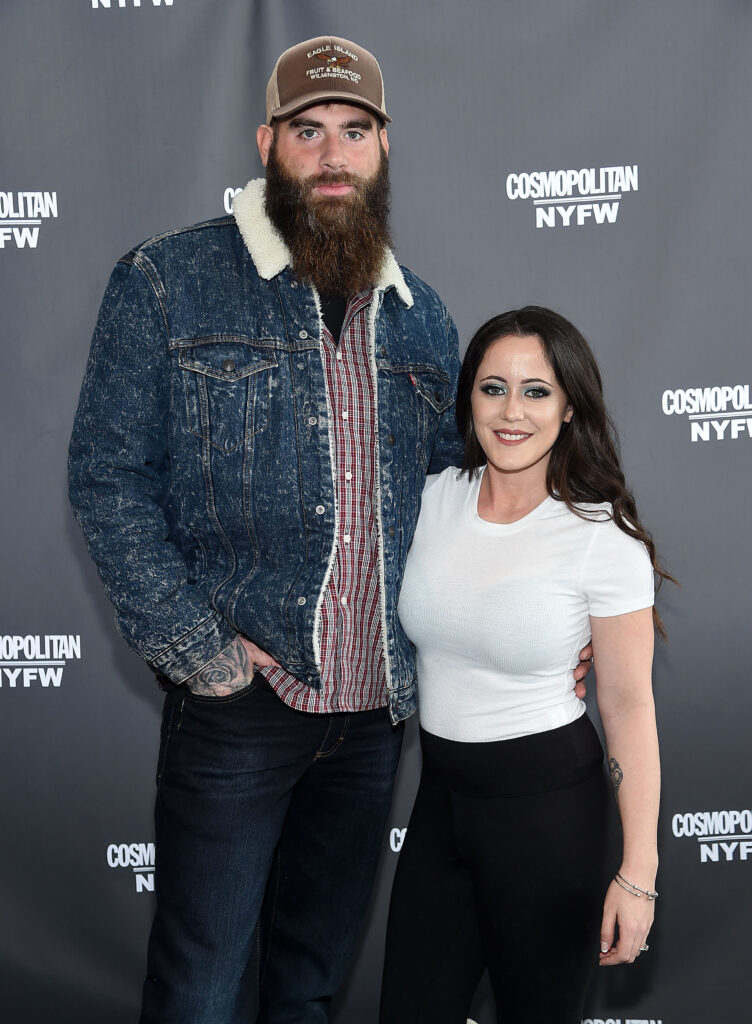 David Eason and Jenelle Evans pose on the red carpet during a ew York Fashion Week event.