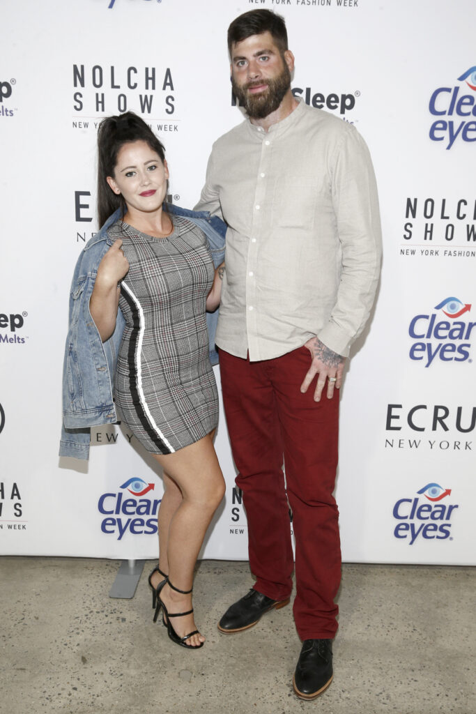 Jenelle Evans and David Eason pose for photographers at a New York Fashion Week event.