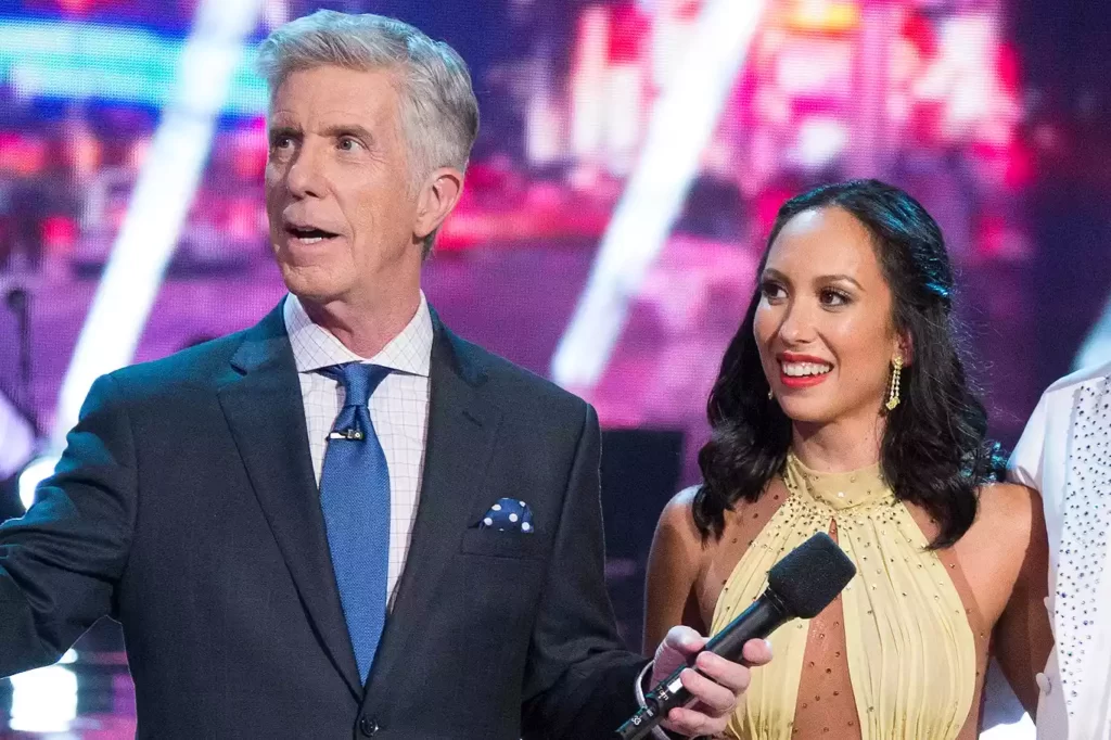 Tom Bergeron is front and center here, alongside Cheryl Burke.