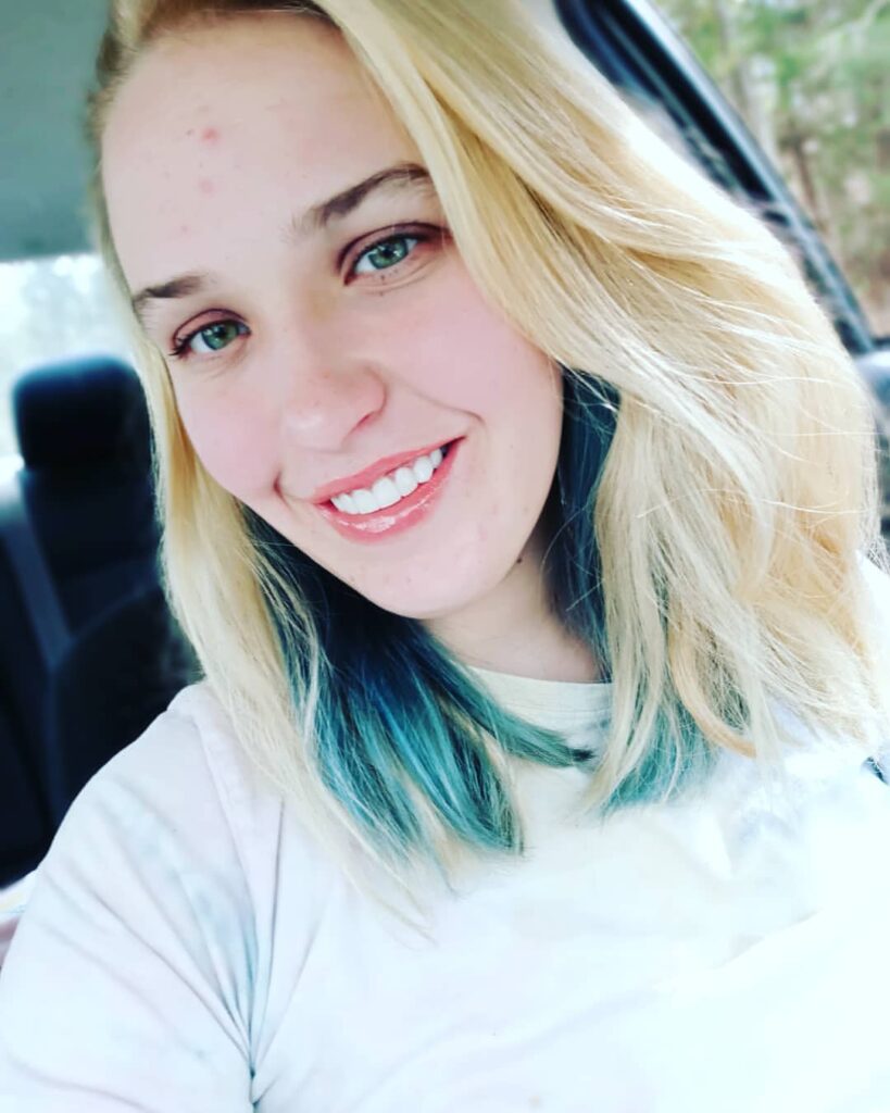 Anna Cardwell shows off beautiful turquoise highlights in her blonde hair.