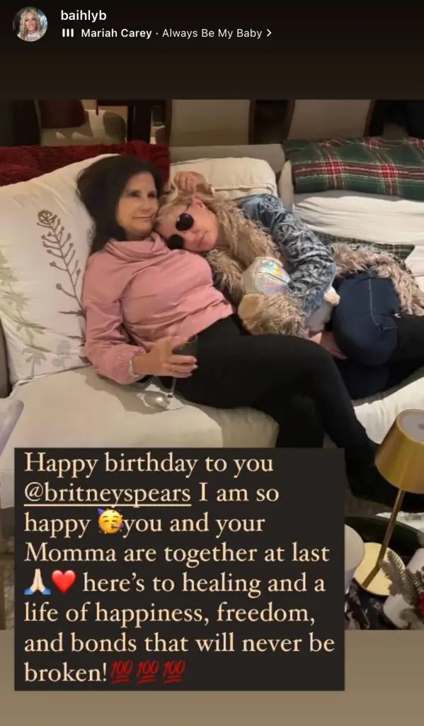 An Instagram Story photo of Britney Spears and mom Lynne Spears in December 2023. They are cuddling on the couch.