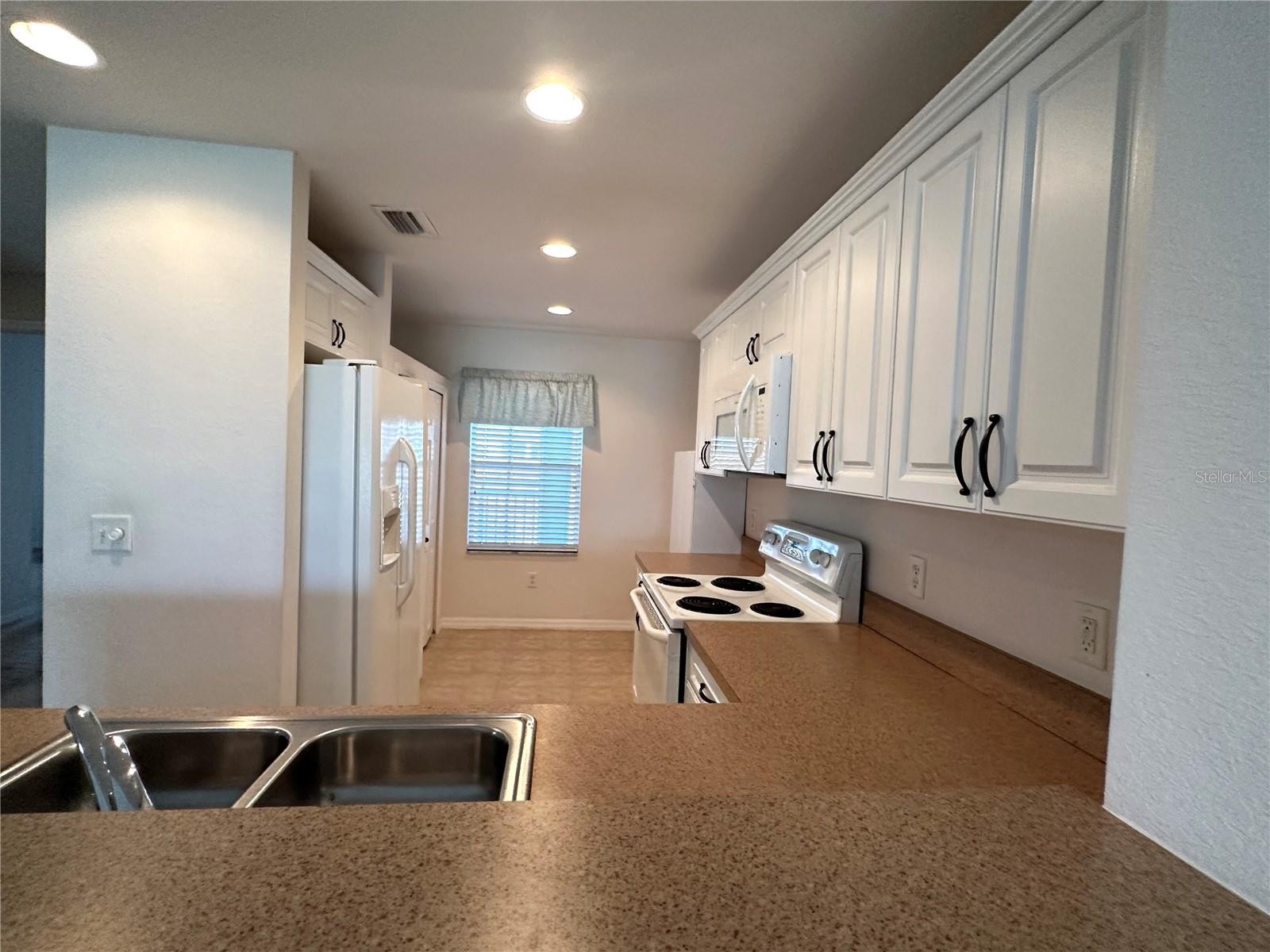 5760 SABAL TRACE DR #202