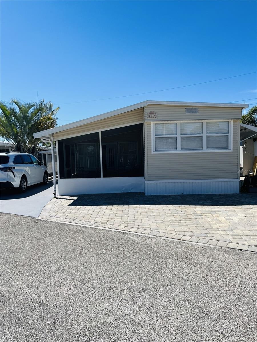 6914 TARPON LN