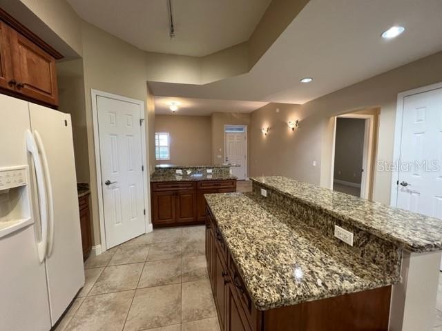 7710 LAKE VISTA CT #303