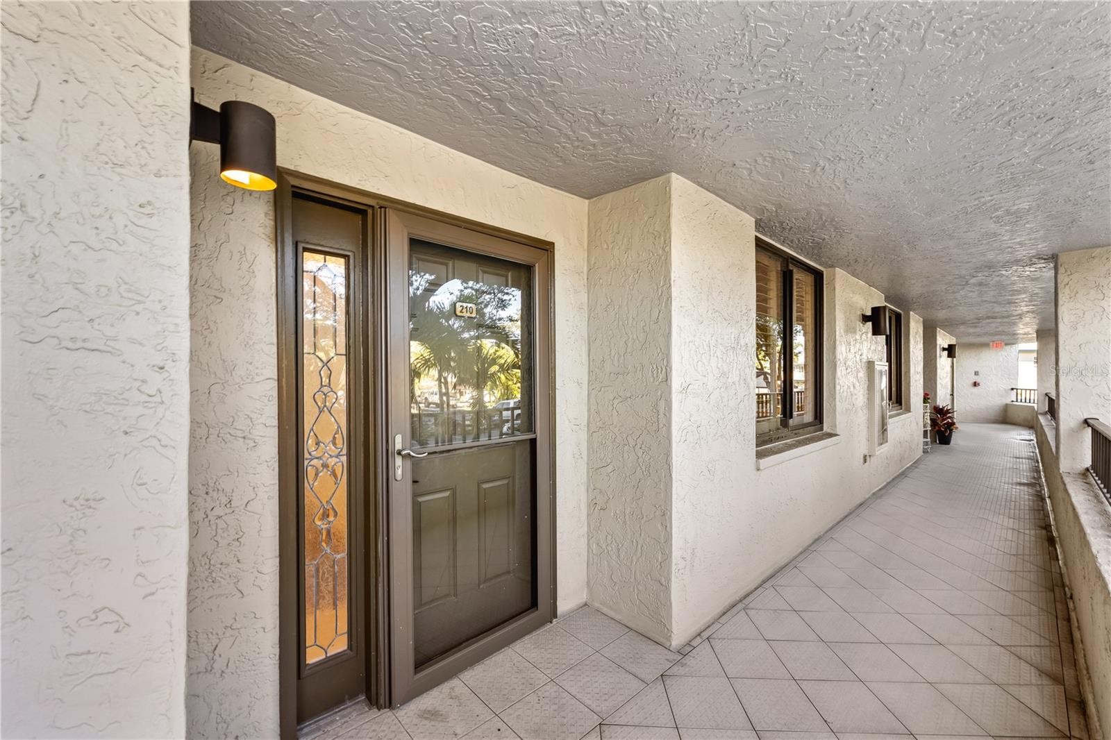 5880 MIDNIGHT PASS RD #210