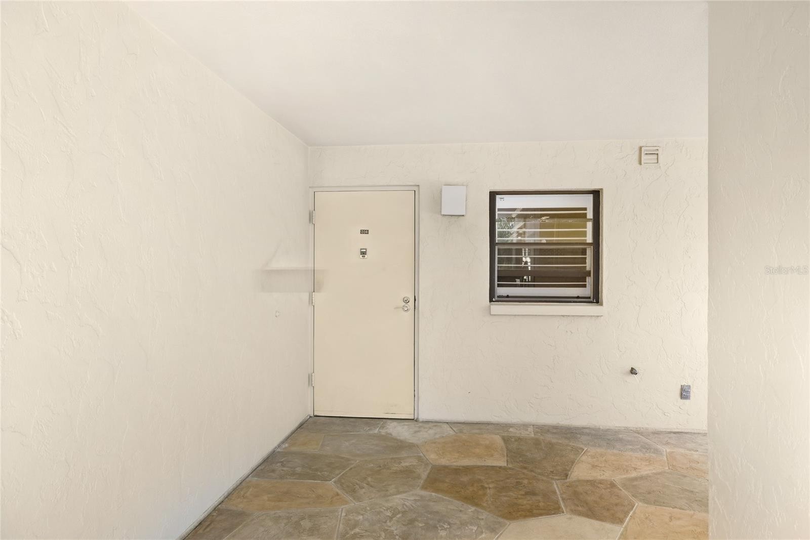 8776 MIDNIGHT PASS RD #C204