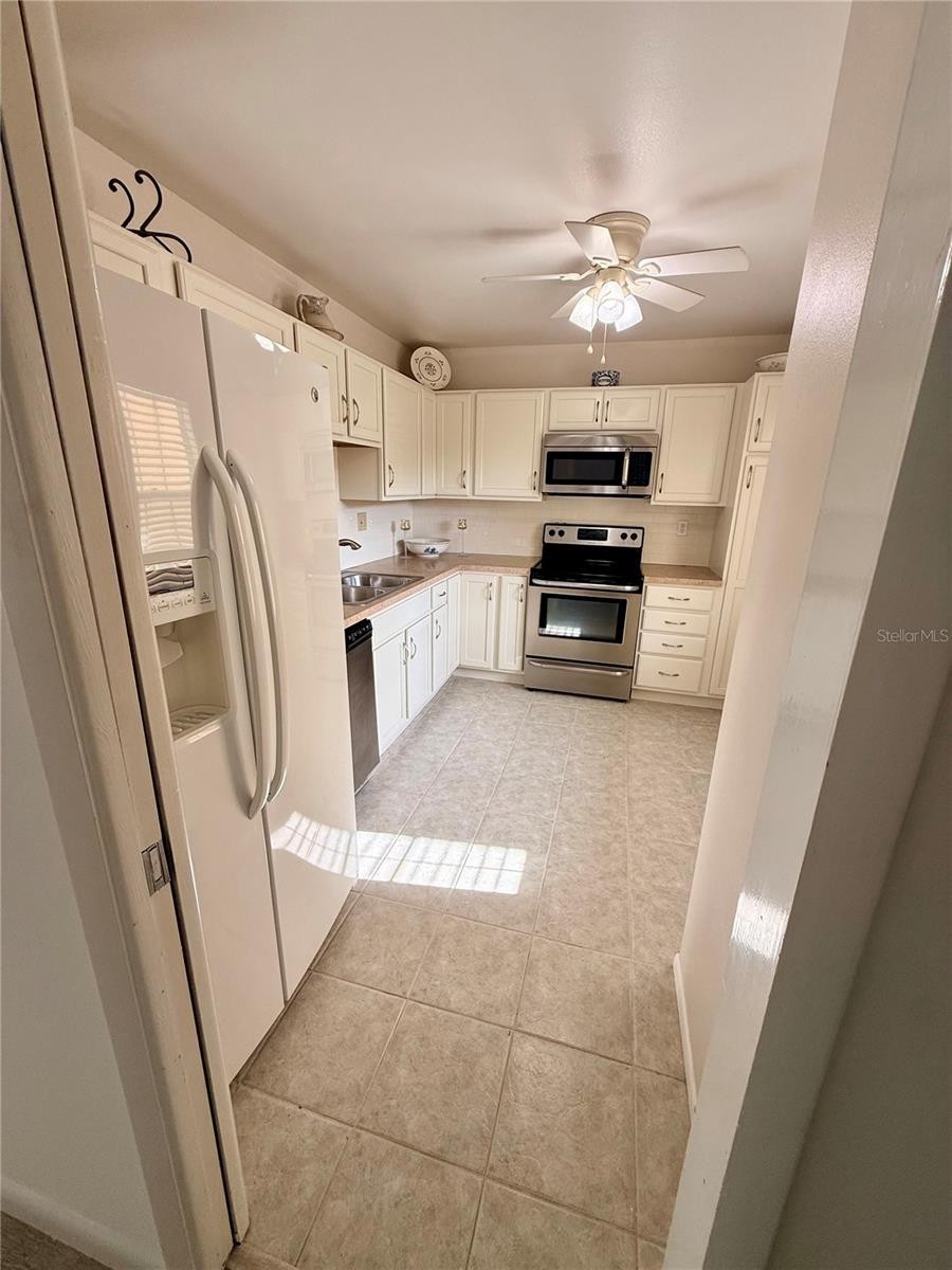 7880 PALM AIRE LN #203