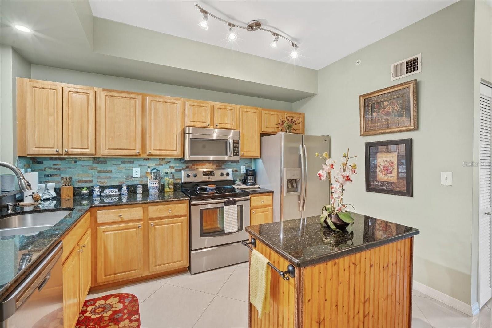 5721 BENTGRASS DR #20-209