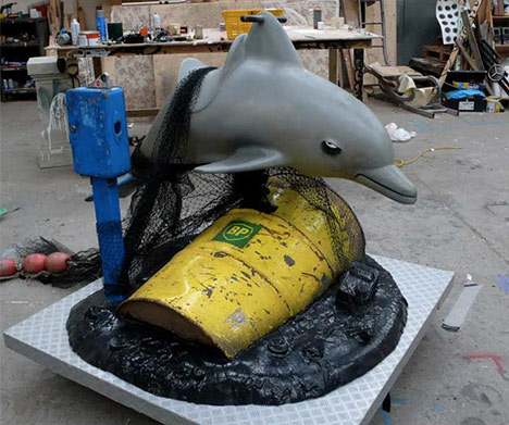 banksy-kiddie-ride-dolphin-bp-oil-photo