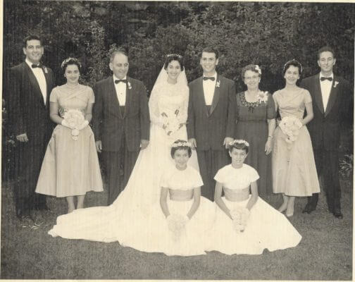 Flora's wedding photo in yard 46 Morris St 1956