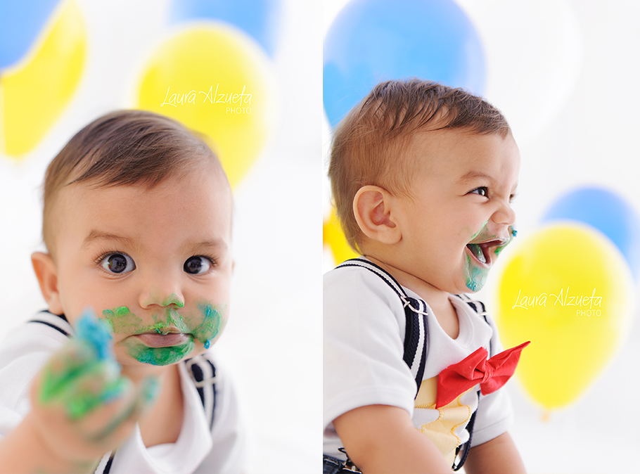 festa com balões coloridos em fotos de estúdio menino sujo de bolo em ensaio Smash the Cake em fotos de aniversário de bebê estúdio fotográfico laura alzueta