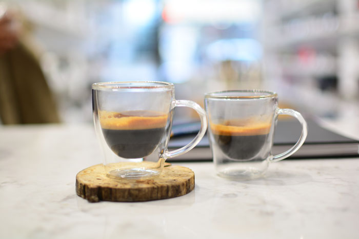 GROSCHE-Turin-double-walled-espresso-cups-on-counter-with-espresso-700