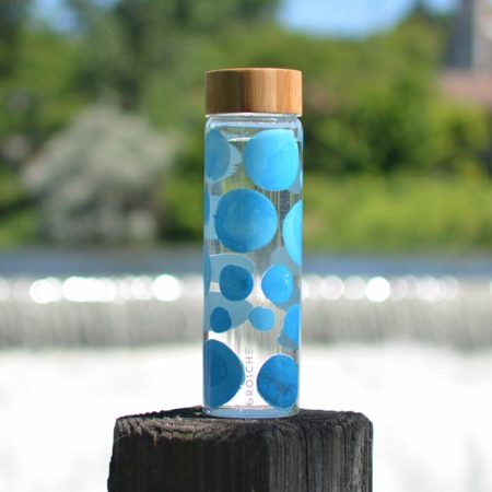 GROSCHE-Venice-GR-384-Blue-Bubbles-print-glass-bottle-with-bamboo-lid-on-wooden-post