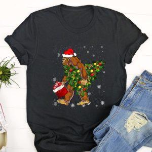 Ugly Christmas T Shirt, Bigfoot Carrying Christmas&hellip;