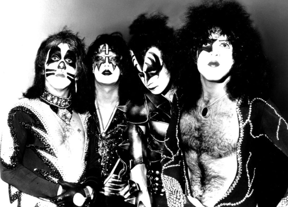 Applying the signature KISS face paint requires precision and patience