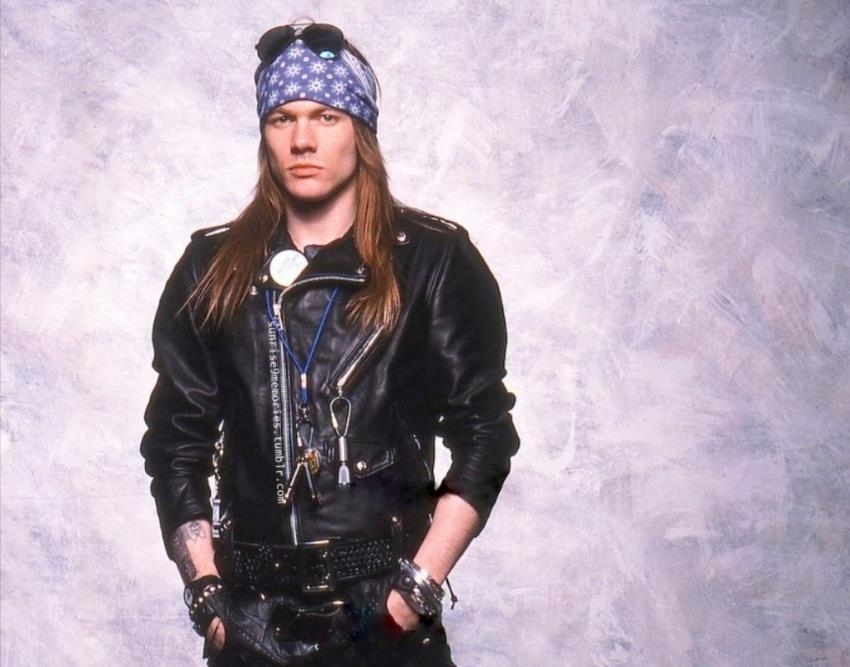 Axl Rose, the band’s frontman, is famous for his distinctive use of bandanas and hats Axl Rose, the band’s frontman, is famous for his distinctive use of bandanas and hats