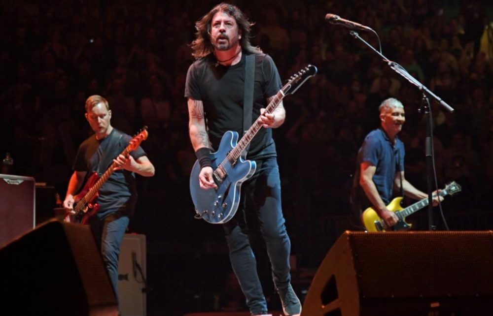 Items like a well worn Gibson guitar, vintage band t shirts, and iconic flannel shirts are essential