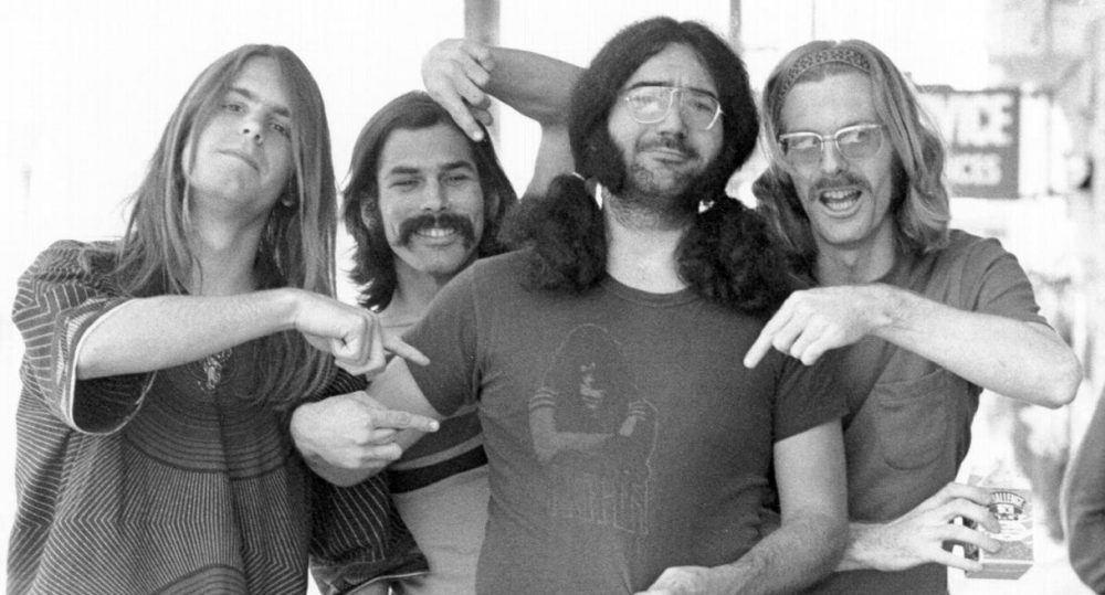 Styling a retro Grateful Dead look involves embracing the carefree and eclectic vibe of the 70s or 80s