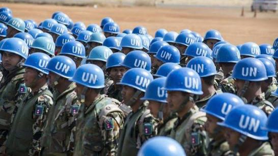 Commentary: “october 1, 2003: The Day The Blue Helmets Came—and The Guns Answered”