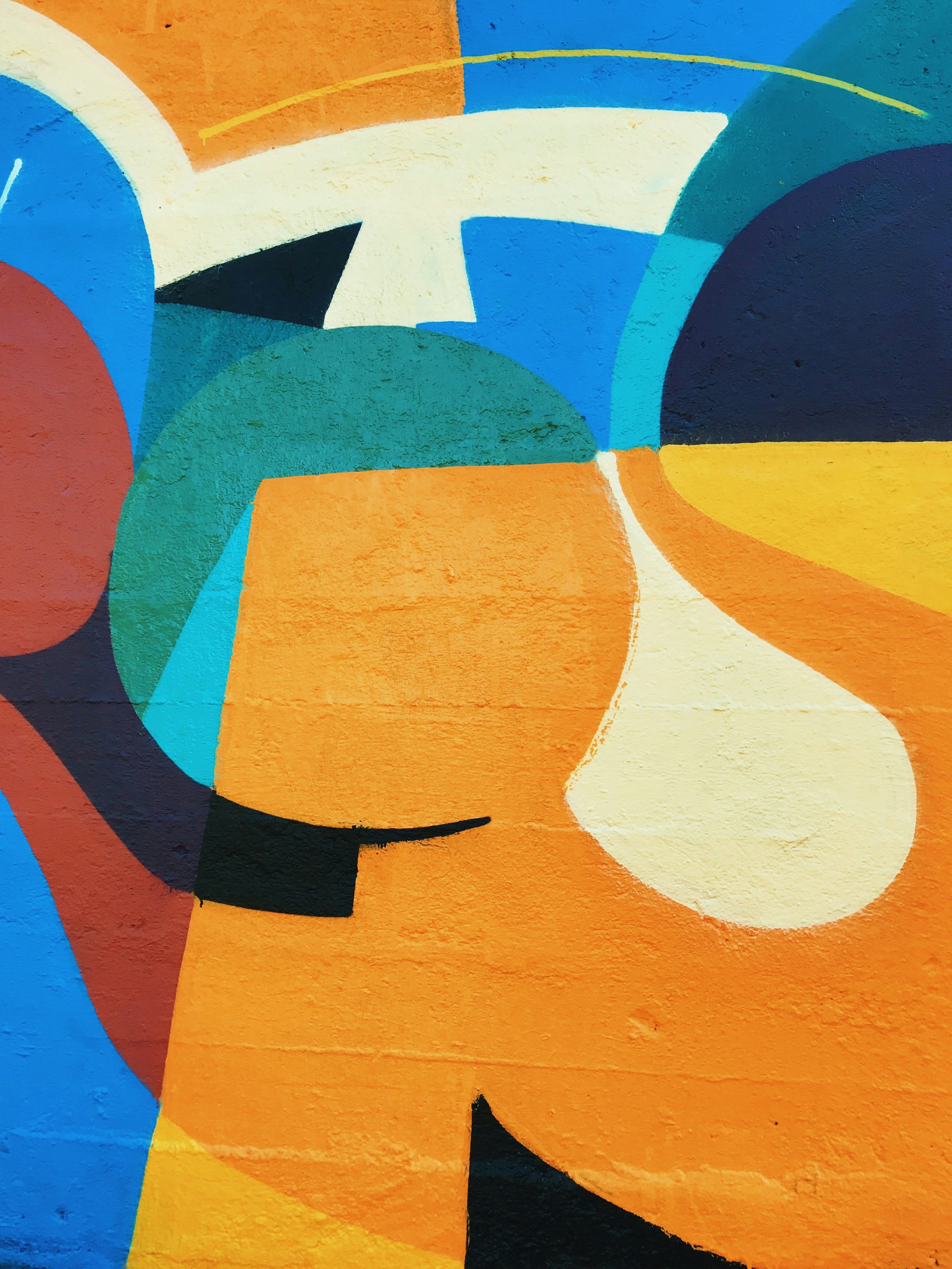 orange, blue, and white abstract art