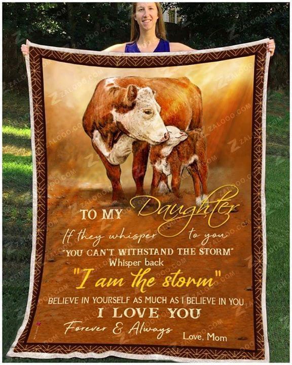 To My Daughter If They Whisper To You You Cant Withstand The Storm Whisper Back I Am The Storm Cow Quilt Blanket