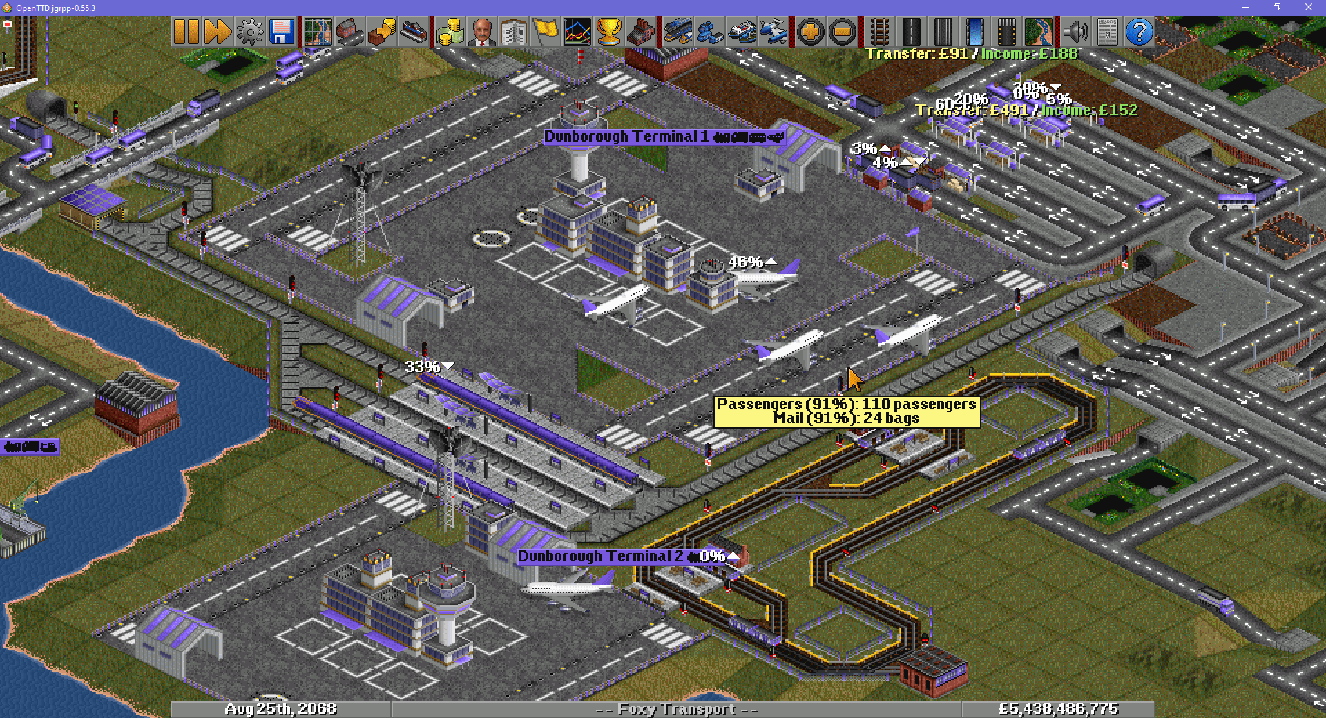 A continental and international airport in OpenTTD labeled as terminals 1 and 2. The intercontinental terminal is fed by maglev trains and a large bus and truck station, and a metro line carries passengers and goods between terminals 1 and 2.