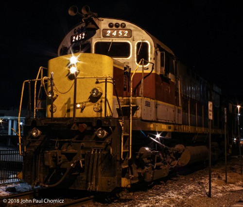 A D & L unit with its headlight left on, idling near Steamtown, on a below freezing night.