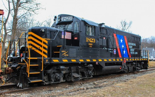 The Dover & Rockaway River Railroad GP-10, painted in the Honoring New Jersey Veterans scheme. It is seen while pulling the Toys for Tots train, in Mount Olive, NJ.