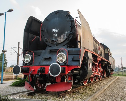 This Polish built class PT47 steam engine #: 13 sits outside the train station in Skarzysko Kamienna, Poland.