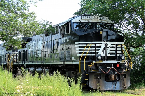 This unit is hiding in the bushes, taking a break from hauling trash trains.