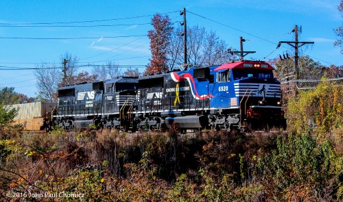 The NS Honoring Our Veterans unit leads a Croxton Bound intermodal train, through Cranford.