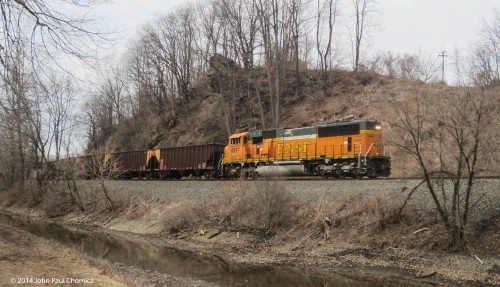 Single BNSF unit leads coal empties back to Allentown Yard.