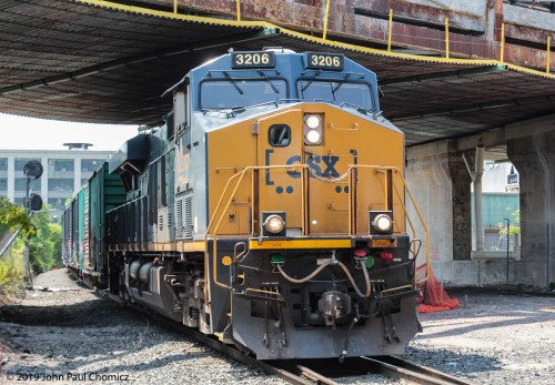 A CSX mixed freight heads north through Jersey City.