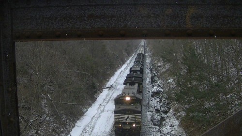 H70 made a rare daylight appearance as moderate snow begins to cover the area. I took this shot at the Twin Arches detector, about 61 miles from Jersey City.

NS CW44-9 9536
NS CW40-8 8422
NS GP38-2's 5610, 5611, 5615, 5617

2/4/2018