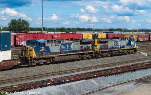 An eastbound intermodal train passes through Selkirk Yard, with two bright futures up front.