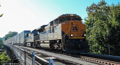 With the sun in a less than ideal spot, the Liberty Lady leads 20W, eastbound, across the Delaware River, on its namesake railroad's home rails.