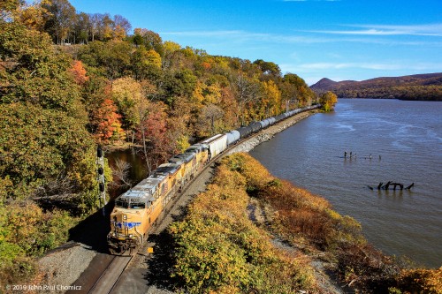 The morning light was at its best when southbound CSX loaded ethanol train K682 came through with two Union Pacific units leading. The yellow of the units fit in nicely with colors of the leaves.