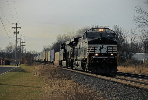 Brand new AC44C6M 4249 leads eastbound intermodal through West Laurel