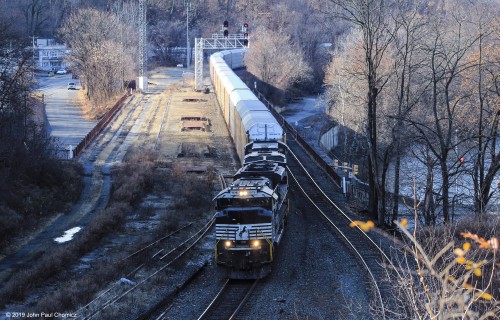 An eastbound NS autorack train passing above the old Lehigh Valley Railroad train station in Easton, Pennsylvania.