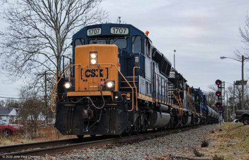 The northbound chemtrain passes by Woodbury Station Café, on its way back to Camden.