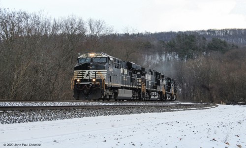 A fast-moving westbound amidst the snow flurries in Newport, PA.