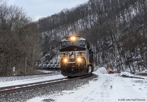 The snow plow just can't keep pace with this westbound empty tank train in Newport, PA.