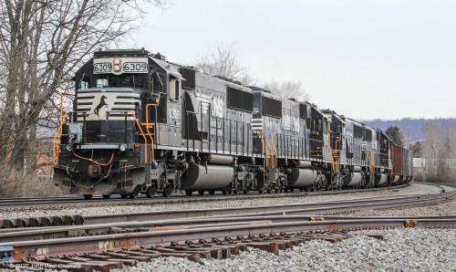 A quartet of standard cab helpers assist the loaded coal train, up the grade, at Portage, PA.