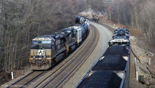 A westbound empty crude oil train meets an eastbound loaded coal train, creating an interesting juxtaposition of fossil fuels, at Cassandra, PA.