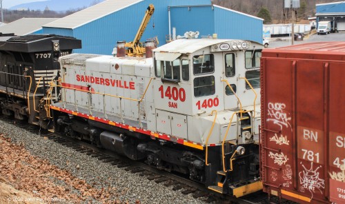 The Sandersville #: 1400 tagged along on this eastbound mixed freight. The switcher is from the Sandersville Railroad. It is a shortline that services some mines and processing plants along nine miles of trackage, in the middle eastern part of Georgia.