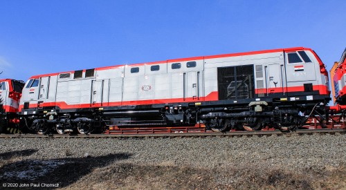 Another view of the Egyptian Railways #: 2512. It is odd to see that the units are not on flatcars, as is the usual mode of transporting new export units. The units were headed for the Port of Norfolk, Virginia and onto a ship bound for the Port of Alexandria, Egypt and on to their final destination of Cairo, Egypt.