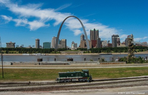 In a moment of perfect timing, the FTRL #: 251 (SW1500), another Cargill Switcher, stopped to let off its conductor. It was in the perfect location that allowed me to photograph this scene of the locomotive with a beautifully aligned backdrop of the Mississippi River, the St. Louis Arch, the Courthouse, and downtown St Louis, MO.